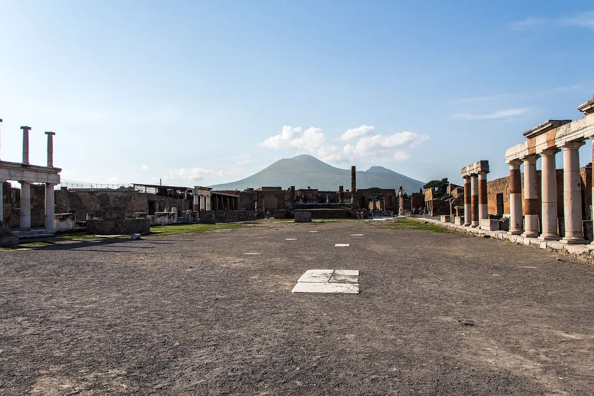 The Forum of Pompeii with column bases and Vesuvius on the horizon