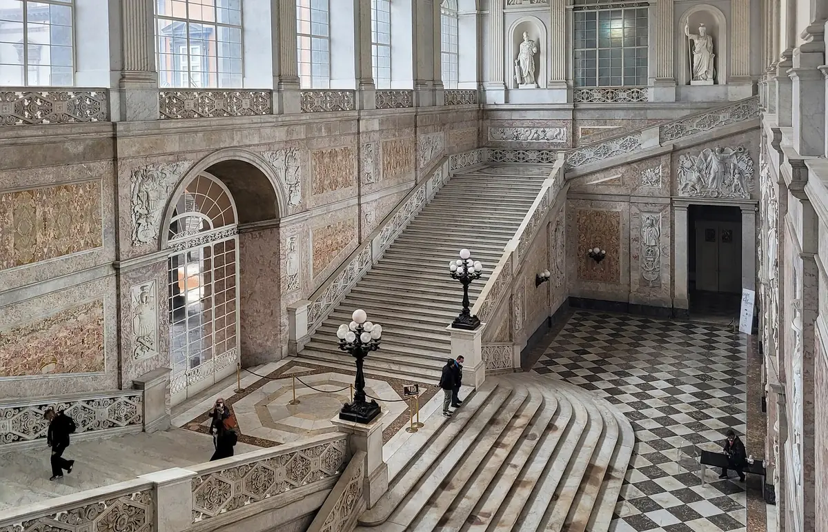 The grand marble staircase of the Palazzo Reale in Naples