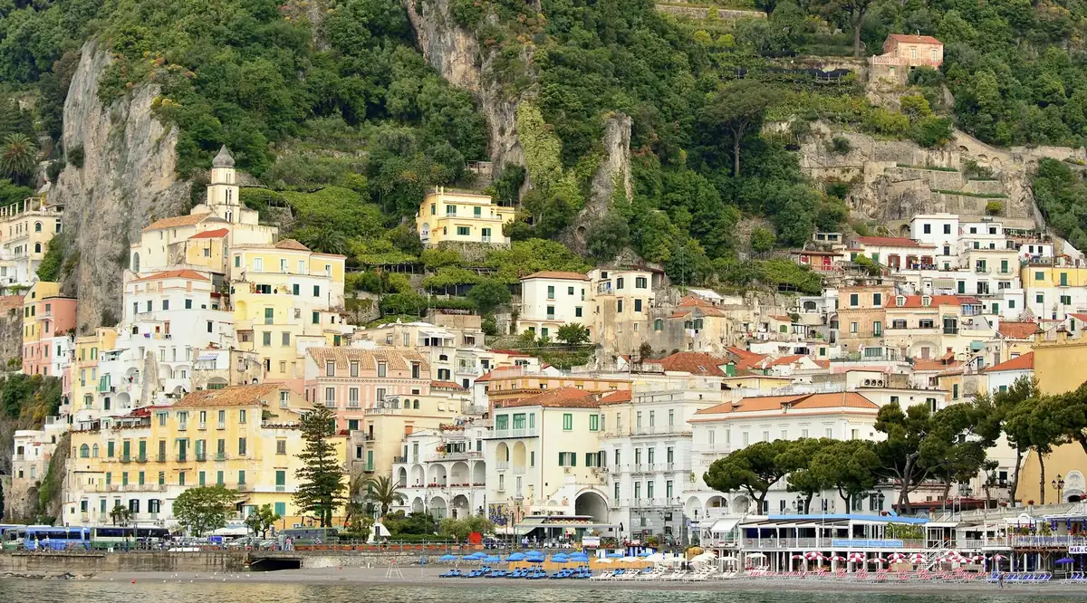 The town of Amalfi and its cliffs seen from a tour boat