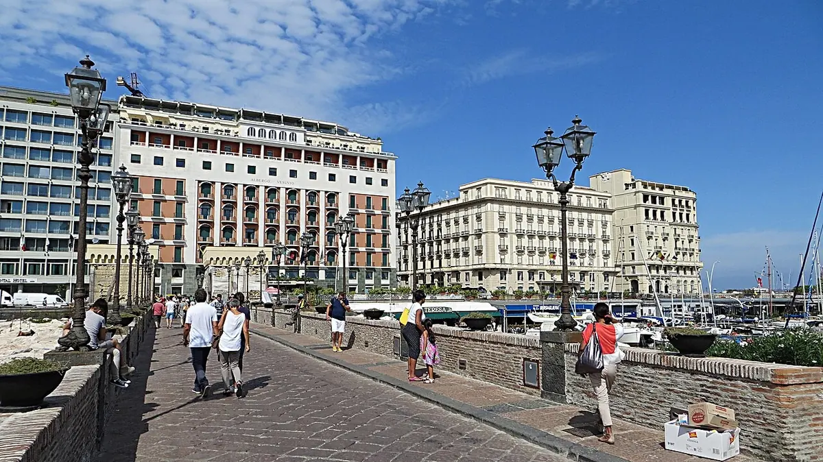 Via Partenope's seafront hotels, Grand Hotel Vesuvio among them, from the Castel dell'Ovo causeway