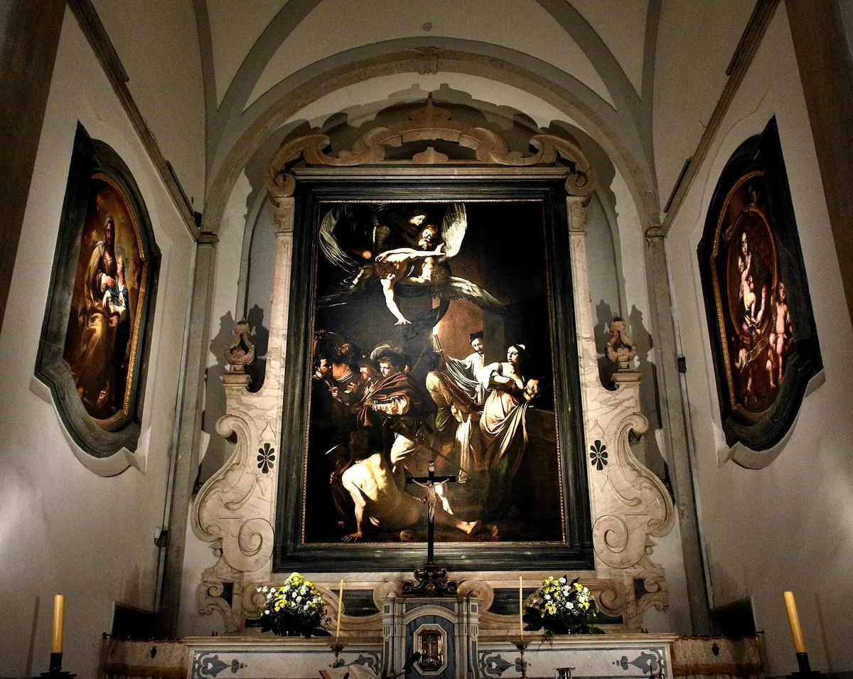 Les Sept Œuvres de miséricorde de Caravage au-dessus du maître-autel du Pio Monte della Misericordia