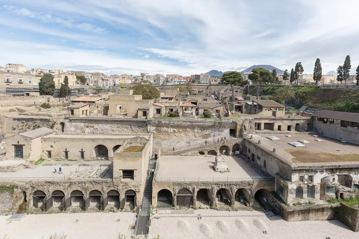 Excavated houses of Herculaneum above the arched boat sheds of the ancient shoreline